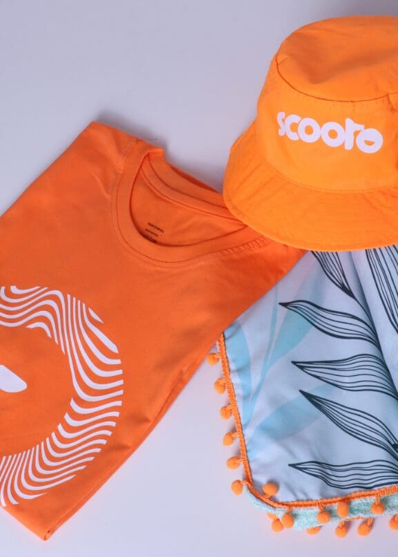 Kit de Engajamento Exclusivo Scooto: Camiseta, Canga e Bucket Hat